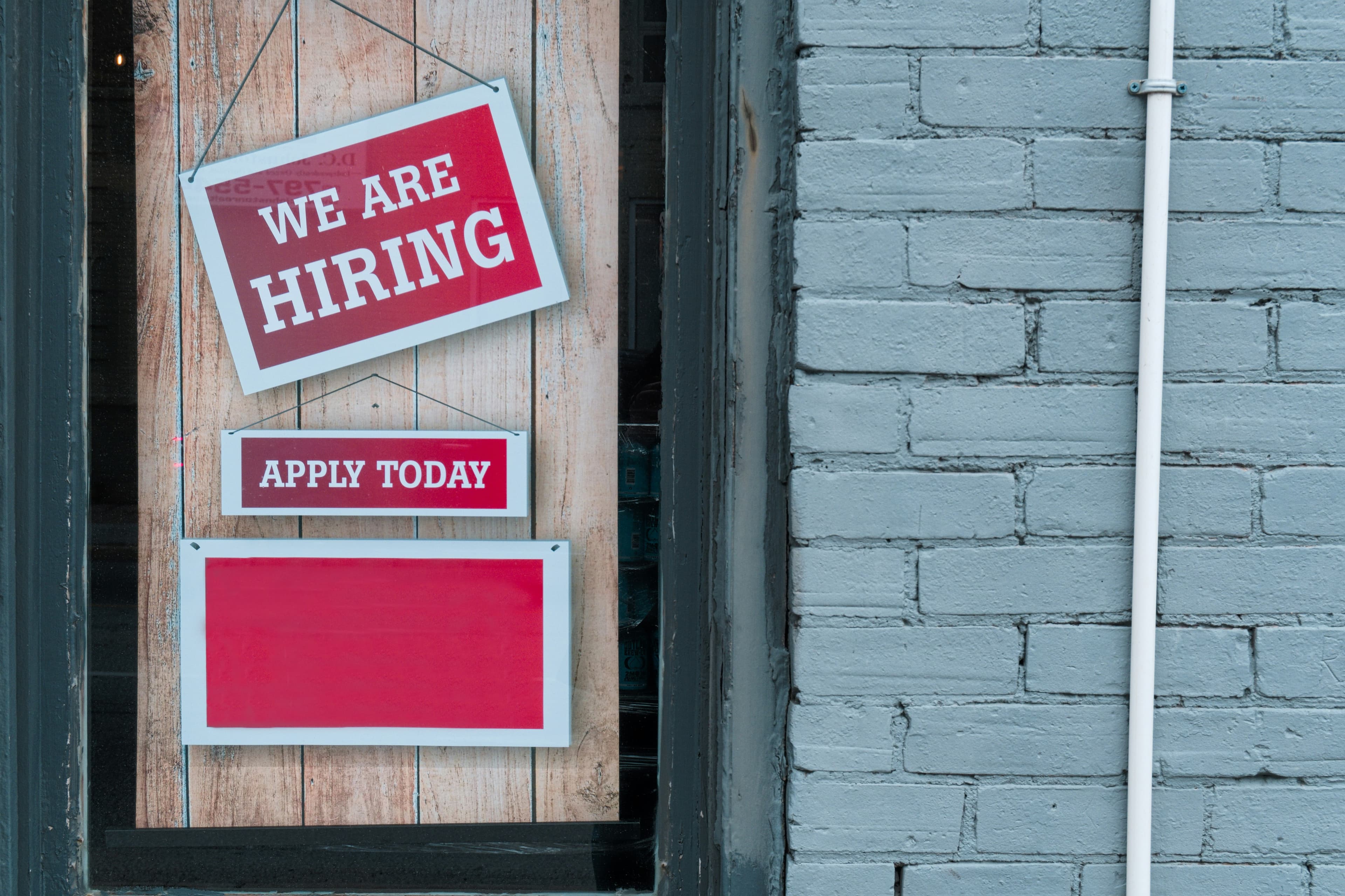 We are hiring and apply today signs